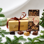 16 fyldte chokolader & 100 g mørk chokoladeplade med mandelsplitter og tranebær